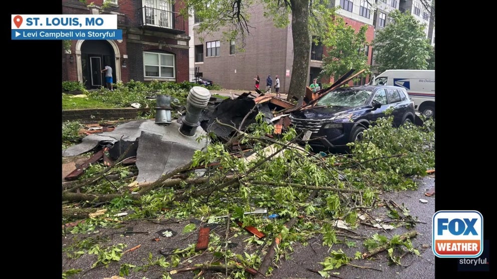 Footage shot on Friday afternoon shows powerful winds in St. Louis, Missouri, hurling brush and debris down Pershing Avenue.
