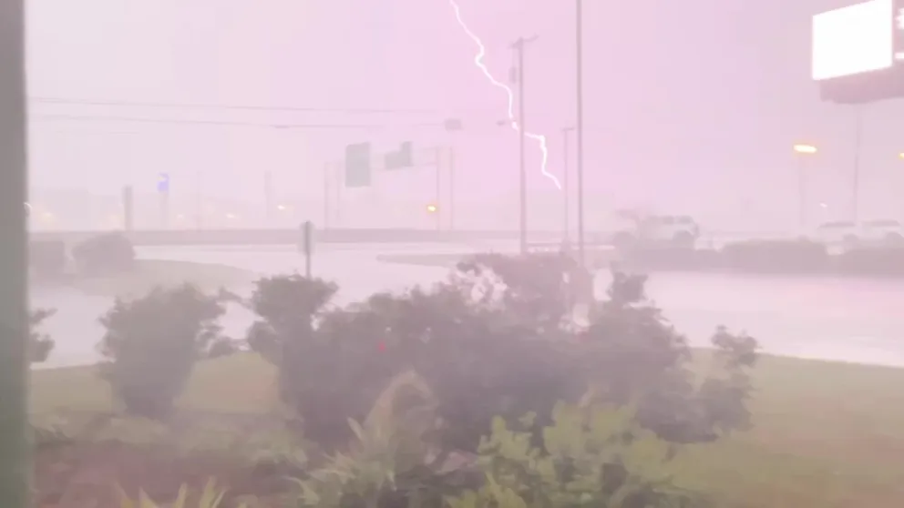 FOX Weather's Mike Seidel and photographer Jarrod Maloney were in the thick of a massive thunderstorm as it swept through the Little Rock, Arkansas area Saturday morning, dodging lightning strikes as the NWS issued a Flash Flood Emergency.