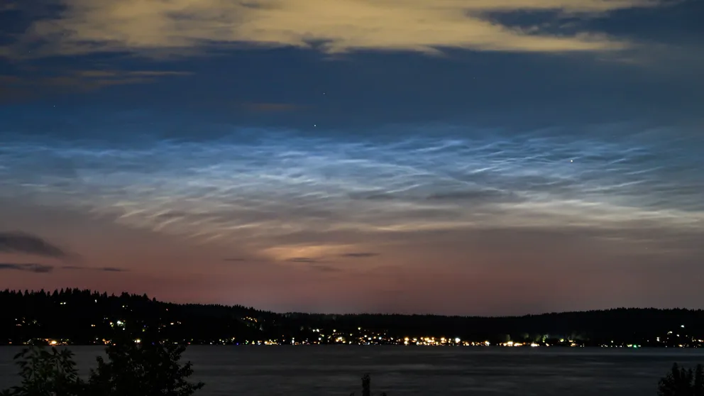 FILE – Glowing noctilucent clouds were spotted over Seattle, Washington (June 2023).