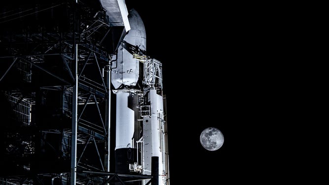 The SpaceX Falcon 9 rocket and the Moon before it launched Blue Ghost Mission 1 on Jan. 15, 2024.