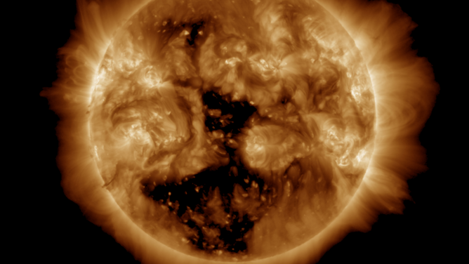 A dark area on the Sun, known as a coronal hole, seen on GOES Satellite image from March 24, 2025.